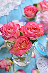 romantic table decoration with pink roses