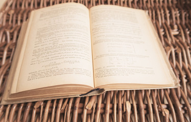 book on wicker  background