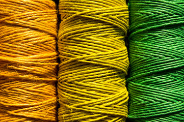 Multicolored sewing threads, background