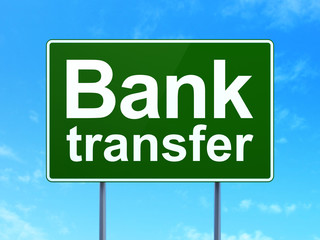 Banking concept: Bank Transfer on road sign background