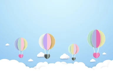 Photo sur Plexiglas Montgolfière montgolfières colorées volant le fond de ciel. Conception de style art et artisanat en papier