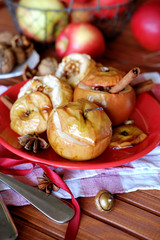 Apples baked in the oven with cottage cheese and walnuts