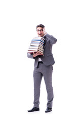 Businessman student carrying holding pile of books isolated on w