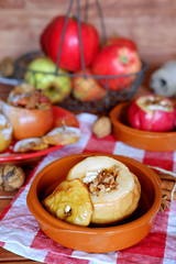Apples baked in the oven with cottage cheese and walnuts