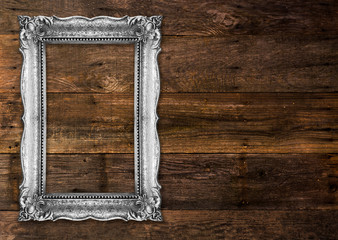 Old Silver Picture Frame on wooden background
