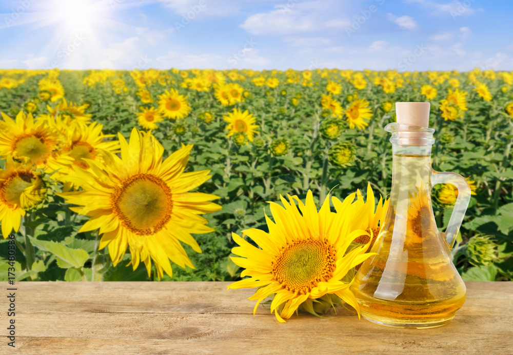 Wall mural sunflower oil in glass bottle