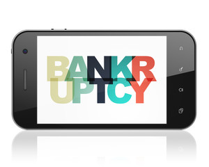 Finance concept: Smartphone with Bankruptcy on  display
