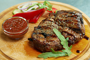 meat steak with sauce and vegetables