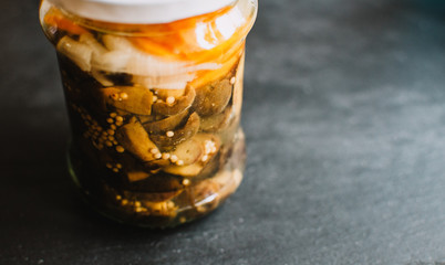 marinated mushrooms,  bay bolete ( Imleria badia ) in jar