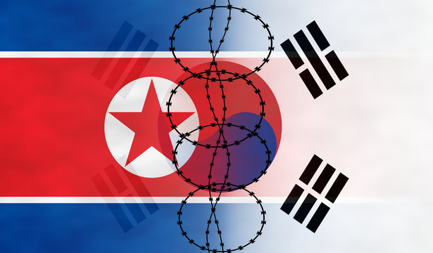 Flags of North and South Korea separated by the barbed wire