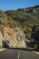 Corsica, 03/09/2017: la Torre di Seneca, antica torre genovese del XVI secolo nel cuore del Capo Corso, vista dalla strada tortuosa che porta a nord