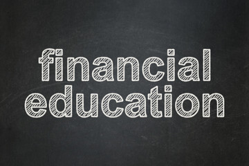 Obraz premium Studying concept: Financial Education on chalkboard background