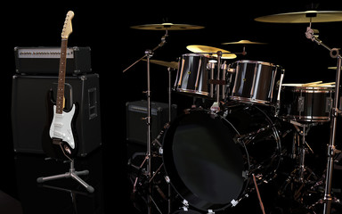 guitar, amplifier & drums in the black music room