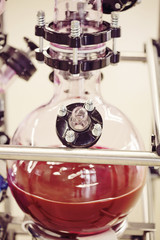 Laboratory chemical machine with moving red liquid
