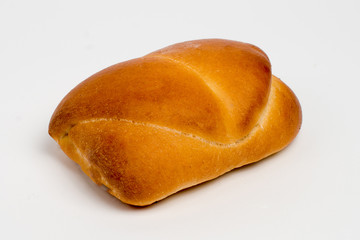 Sweet cinnamon bun roll swirl isolated over the white background