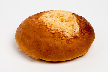 Sweet cinnamon bun roll swirl isolated over the white background