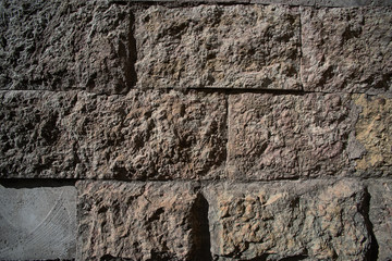 Texture of a brick wall with cement, close