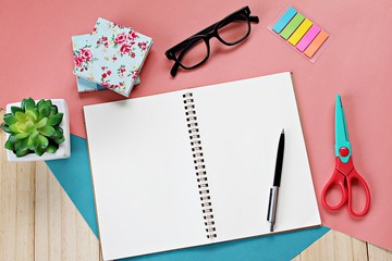 Still life, business, office supplies or education concept : Top view or flat lay of open notebook paper with blank pages and accessories on wooden background, ready for adding or mock up