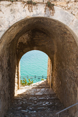 A view to the sea through an old castle corridor at Nafplion 