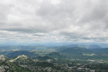 Fototapeta na wymiar Mountain landscape before a summer rain. Panoramic view of Montenegro