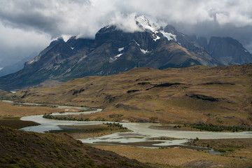 River valley at the foot of the mountain. National Park Torres del Paine. Patagonia. Chile.