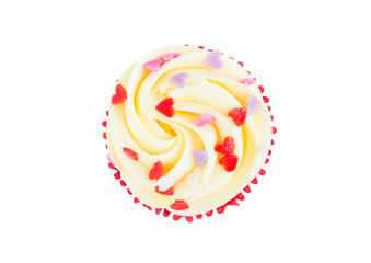 Red Velvet Cup Cake topped with red, purple, pink heart icing isolated on white background (Clipping Path included) for special holiday celebration, Valentines day or Christmas season, top (flat lay)