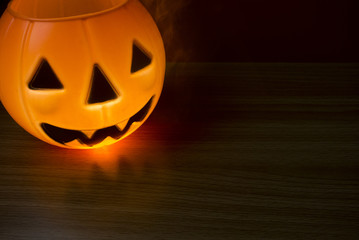 pumpkin halloween lamp pot with hot fire smoke