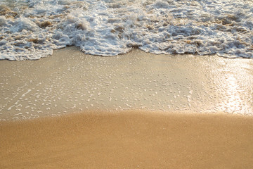 Photograp of small wave in beautiful sunlight.