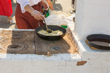 cooking pies on the stove