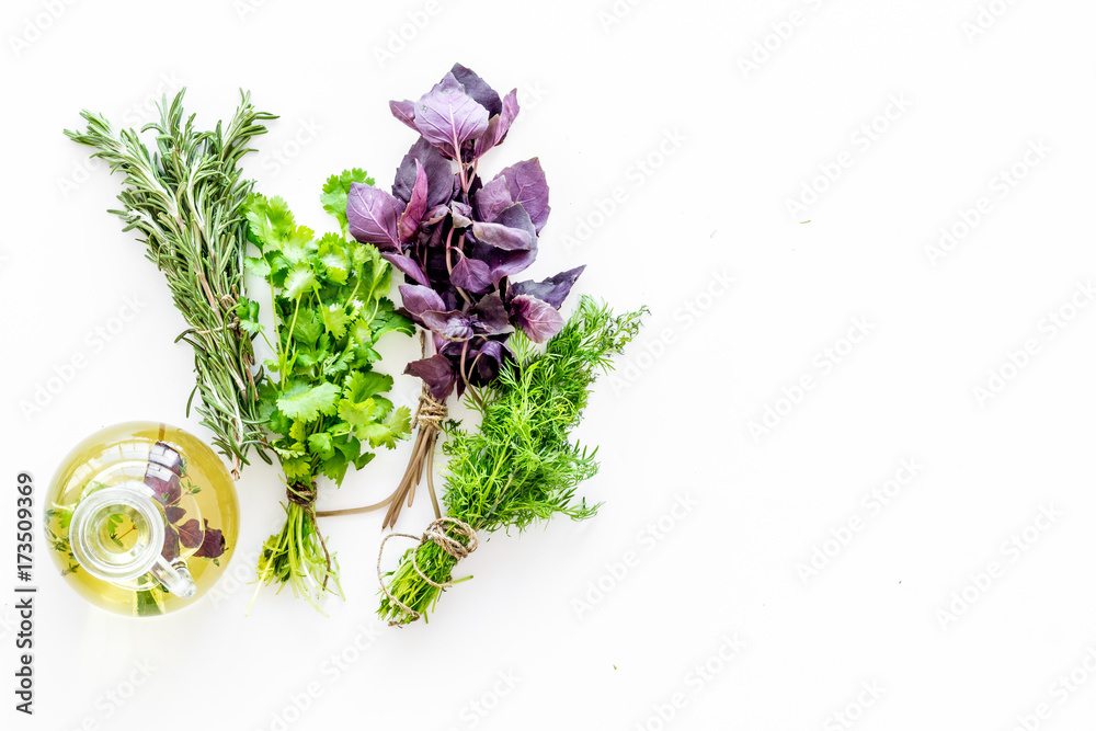 Poster greenery with natural oil for cooking on white kitchen table background top view mock-up