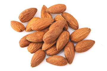 peeled almond seed on white background