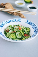 Thai cucumber salad with sesame and chili, dressing for salad, Asian cuisine