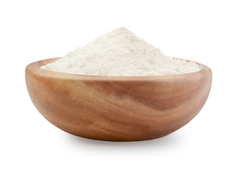 Fototapeta na wymiar Flour in a wooden bowl isolated