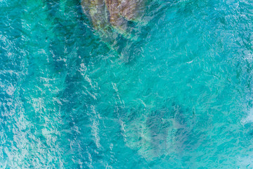 the surface of the water, turquoise in color with bird's eye