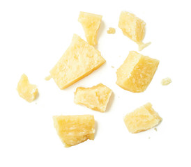 Parmesan cheese pieces on white background. Italian cheese slices. Top view. - obrazy, fototapety, plakaty