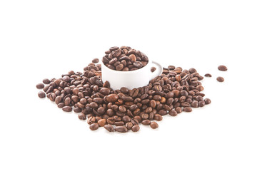 White cup and coffee beans