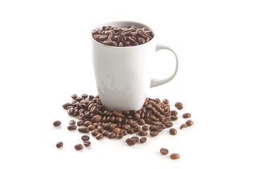 White cup and coffee beans