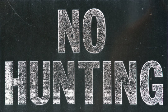 No hunting sign, black and white old vintage no hunting sign