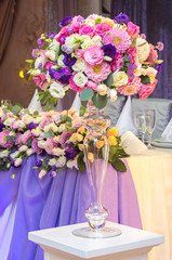 wedding arrangement of fresh flowers in a vase