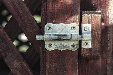 Old lock on the old wood door