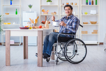 Disabled man preparing soup at kitchen