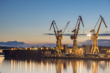Fototapeta premium Szczecin, Poland-September 2017: Buildings, cranes and dry docks repair yard Gryfia,Szczecin