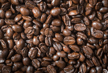 Close up dark roasted coffee beans for background texture