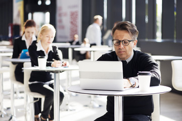 Business people in cafe