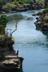 Fototapeta na wymiar Jump to the river