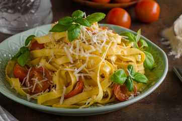 Pasta semolina with tomatoes and parmesan cheese
