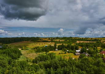 Russian provincial landscape/A series of photos with Russian provincial scenery. Summer, noon, deciduous forest, lake, small houses. Russia, Pskov region, nature, landscape