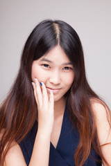 Portrait of beautiful young Asian woman.