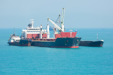 Transfer of the cargo at sea.