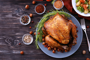 Tasty roasted turkey on plate - obrazy, fototapety, plakaty